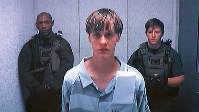 Dylann Storm Roof appears by closed-circuit televison at his bond hearing in Charleston, South Carolina June 19, 2015 in a still image from video.  REUTERS/POOL 