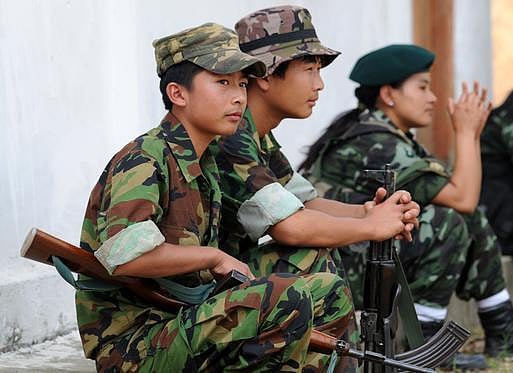 Newly recruited young Naga boys with their automatic weapons during the 33rd Republic Day celebration of the National Socialist Council of Nagalim (Isak-Muivah) in Nagaland on March 21, 2012. File Photo: Ritu Raj Konwar 