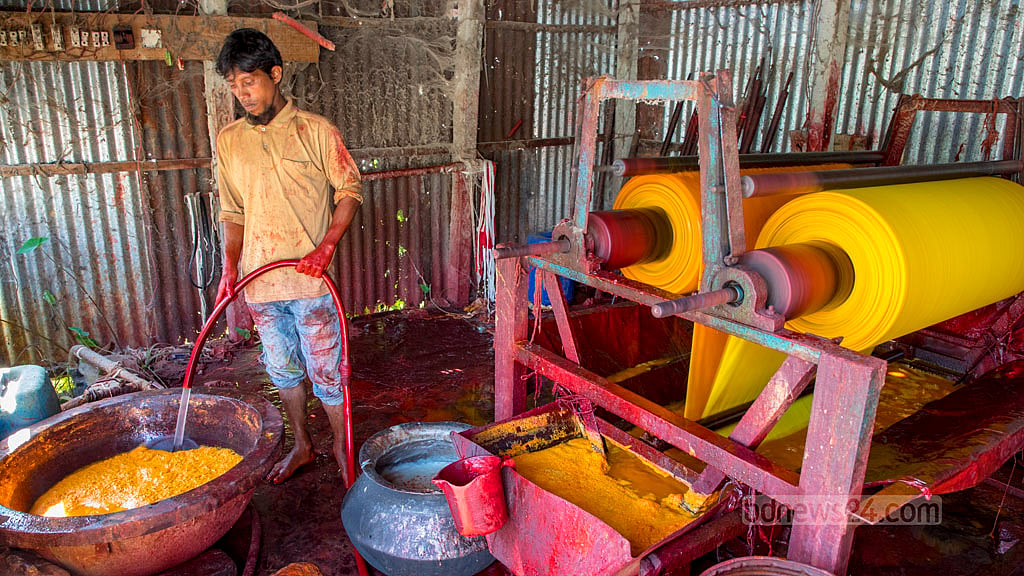 This dyeing process involves several stages before the cloth is cured.