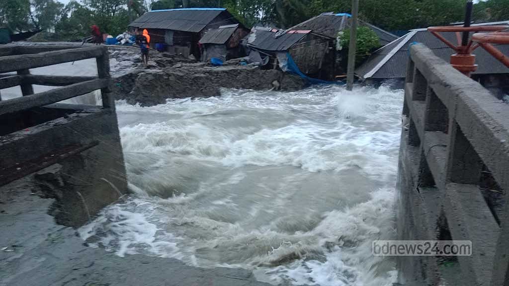 জলবায়ু পরিবর্তনে বেড়েছে ঝড়, তার প্রভাবে জলোচ্ছ্বাসে ভাঙছে বাঁধ।