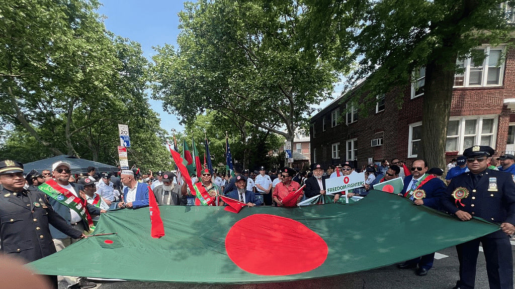 Bangladeshi expatriates holding flags at the Bangladesh Day Parade in New York, USA. File Photo