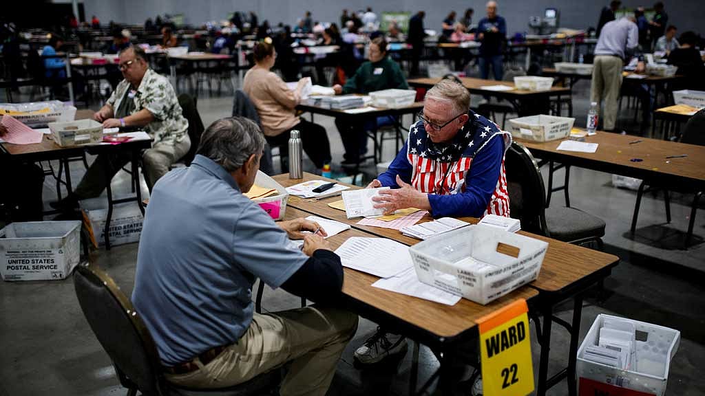 Electoral workers count votes during the 2024 US presidential election, in Milwaukee, Wisconsin, US, November 5, 2024.  Reuters