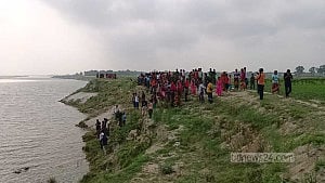 Beheaded body found floating in Padma River