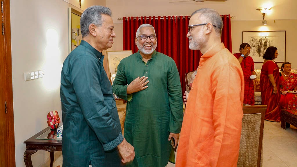 BNP Standing Committee Member Amir Khosru Mahmud Chowdhury attends the Bengali New Year celebration on Monday, Apr 14, 2025. He is seen chatting with bdnews24.com Editor-in-Chief Toufique Imrose Khalidi and renowned band musician Naquib Khan.