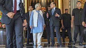 Yunus returns from Malaysia
