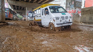 Gaping potholes pockmark road in Uttara’s Abdullahpur