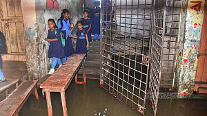 Waterlogged Ctg school holds classes on 3-floor balcony
