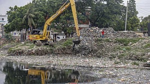 DNCC workers clear a canal