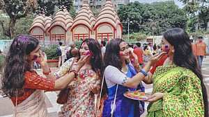Devotees celebrate Dol Purnima