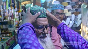 Crowds throng attar and skull cap shops as Eid nears