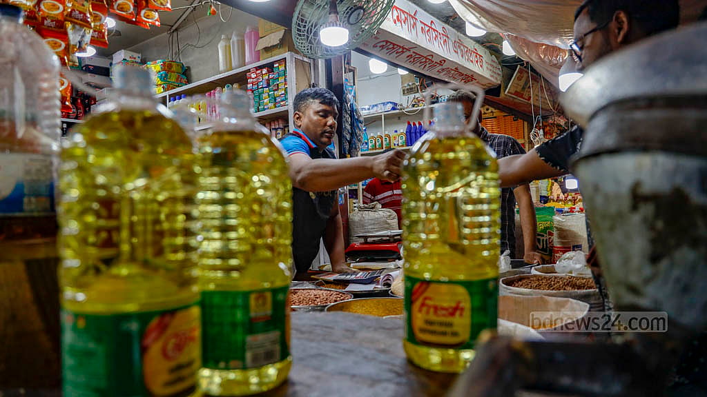 Several bottles of soyabean oil are displayed in front of a shop in Dhaka’s Karwan Bazar.