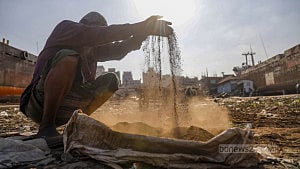 Brass hunter sifts through dust to earn a living
