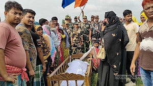 Daughter bids last goodbye to father at zero line