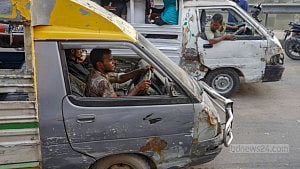Ramshackle four-wheelers packed with passengers