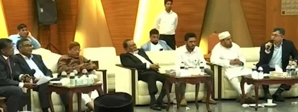 A debate unfolds between BNP’s Salahuddin Ahmed and Jamaat’s Shishir Monir during National Consensus Commission discussions on the referendum.