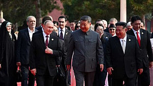 Xi projects power at military parade with Putin, Kim