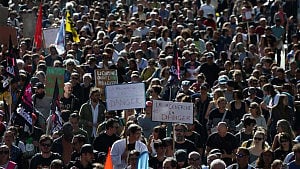 French unions strike against austerity, pressuring Macron