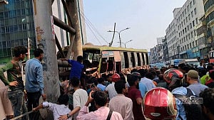 Two killed as bus climbs road divider in Banani
