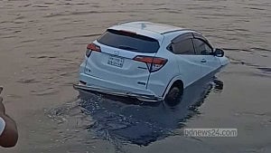 Car plunges into Shitalakhya at ferry ghat