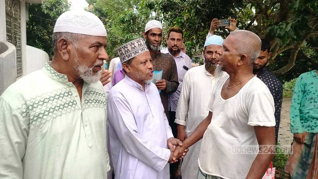 Jamaat candidate Abu Taleb Mondal campaigning and reaching out to voters in Pabna-4.