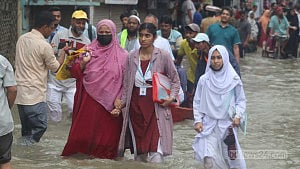 কোমর পানি ঠেলে ভেজা কাপড়ে পরীক্ষা, কুমিল্লার সেই কেন্দ্র পরিবর্তন