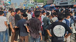 এইচএসসি পরীক্ষা স্থগিতের দাবিতে জয়পুরহাটে বিক্ষোভ