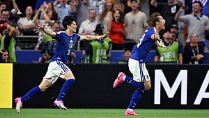 Japan battle back to draw with Netherlands
