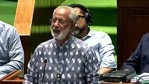 বাজেটের প্রশংসায় আয়াতের ব্যাখ্যা নিয়ে সংসদে বিতর্ক