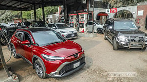 Rationing ends, but long queues linger
