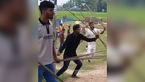 30 hurt in row over filming, photographing girls