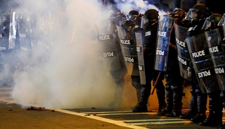 Second night of unrest flares in North Carolina after police kill black man