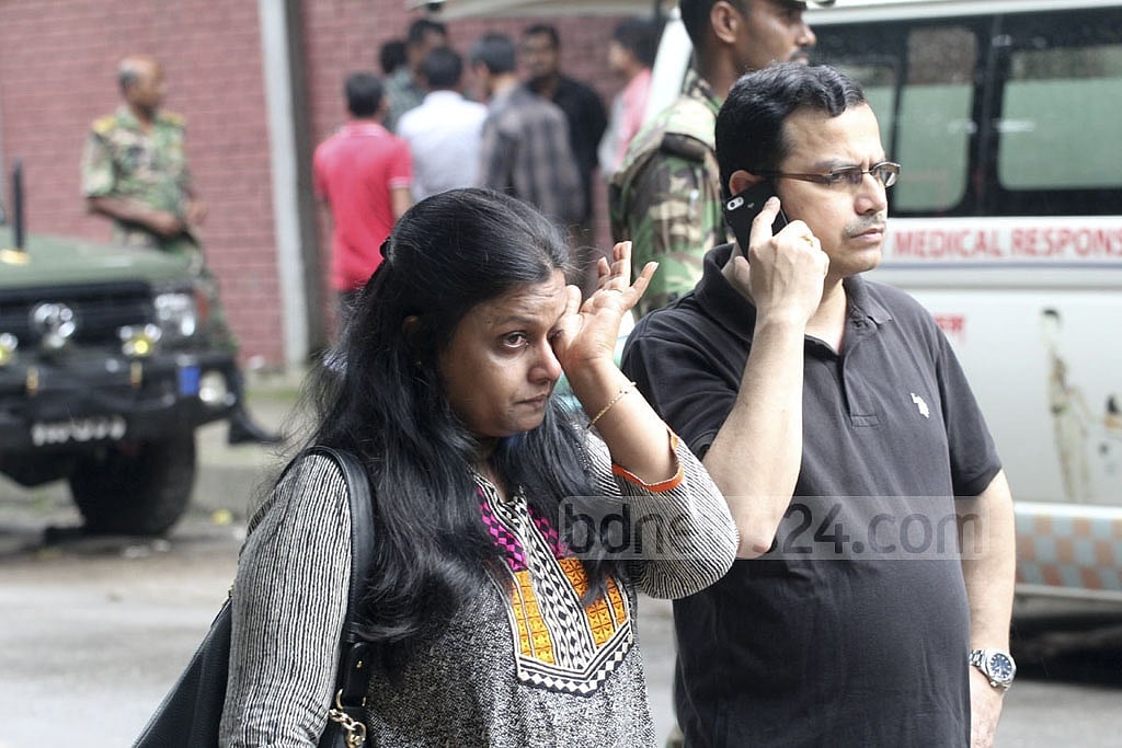 Relatives waited anxiously as bullet sounds were heard coming from the restaurant. 