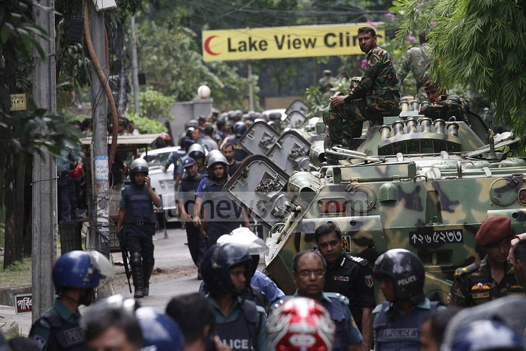 The battle ends. Army armoured vehicles return from ill-fated Holey. 