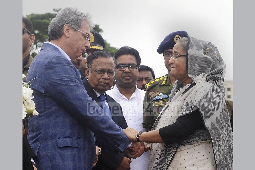 Prime Minister Sheikh Hasina consoles Italian Ambassador Mario Palma at Dhaka's Army Stadium. Of the 20 butchered inside Holey, nine were Italians.  