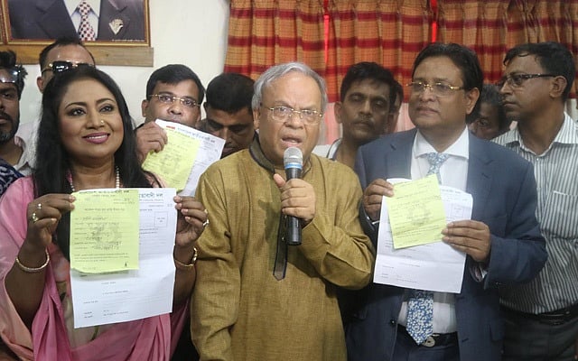 File Photo: Singer Baby Naznin and film actor Helal Khan receiving the BNP's nomination form from Senior Joint Secretary General Ruhul Kabir RIzvi at the party's Naya Paltan office in Dhaka on Monday. Photo: Abdullah Al Momin 