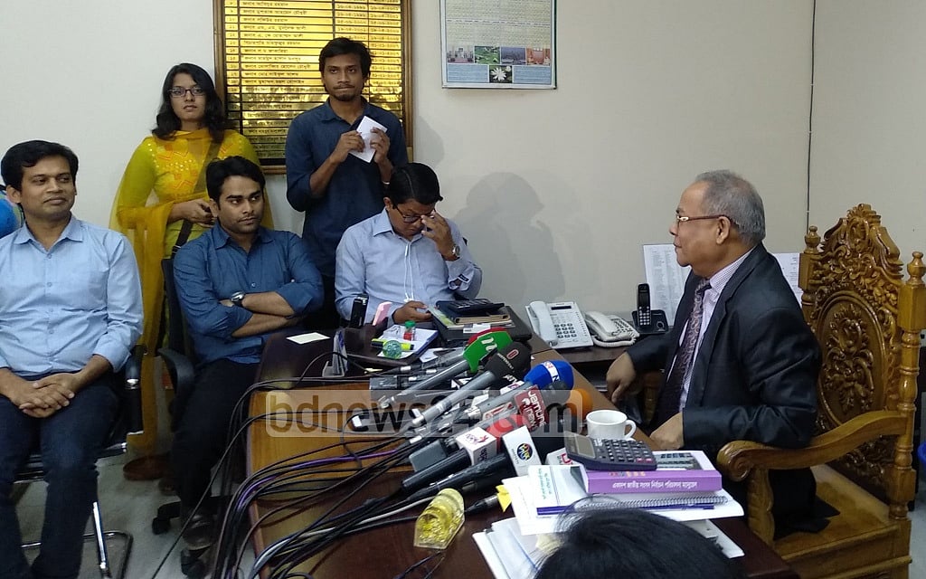 Election Commissioner Md Rafiqul Islam speaking to reporters. 