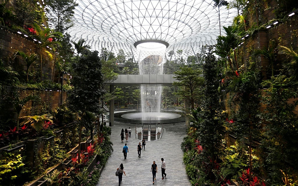 The Changi Airport control tower is pictured next to Jewel in Singapore, April 11, 2019. Reuters 