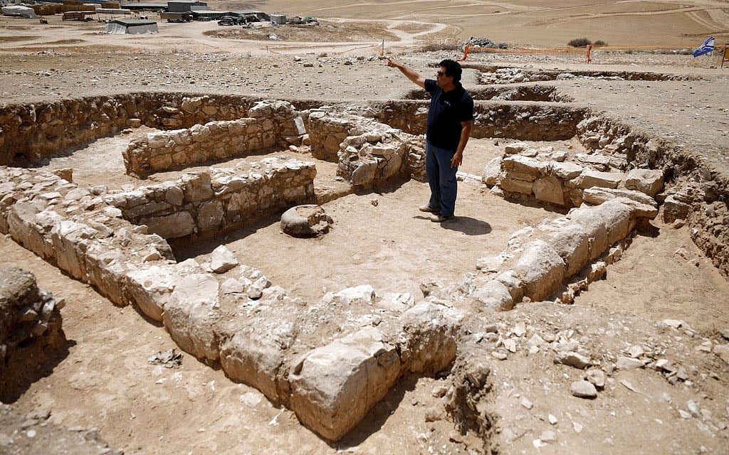 An archaeologist gestures as he stands inside the remains of a mosque discovered by the Israel Antiquities Authority and which they say is one of the world's oldest mosques, in the outskirts of the Bedouin town of Rahat in southern Israel July 18, 2019. Reuters 