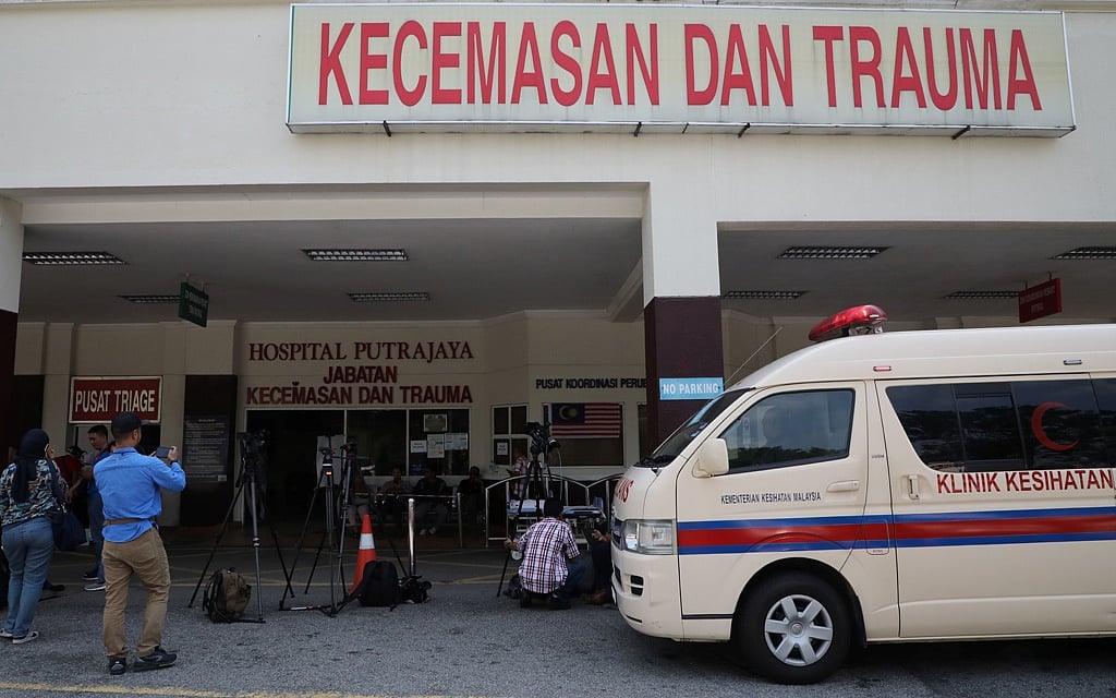 Members of the media wait outside the Putrajaya Hospital for Japanese badminton player Kento Momota after his injury in a pre-dawn vehicle collision in Putrajaya, Malaysia, Jan 13, 2020. REUTERS 