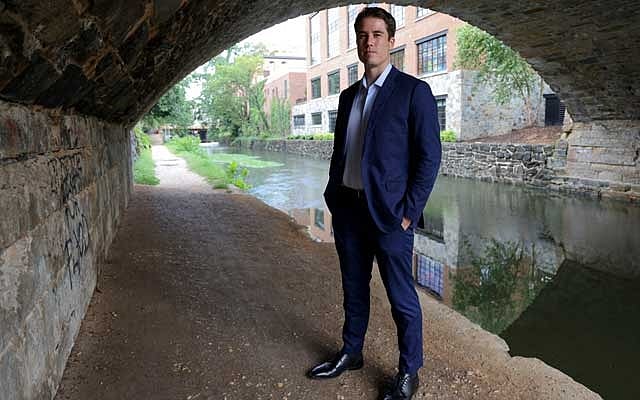 Giancarlo Granda, who was befriended by Liberty University President Jerry Falwell Jr and his wife Rebecca while he was working as a pool attendant at a luxury Miami Beach hotel and was later backed by them in a business venture involving a youth hostel, poses for a portrait in Washington, US, August 10, 2020. Reuters 