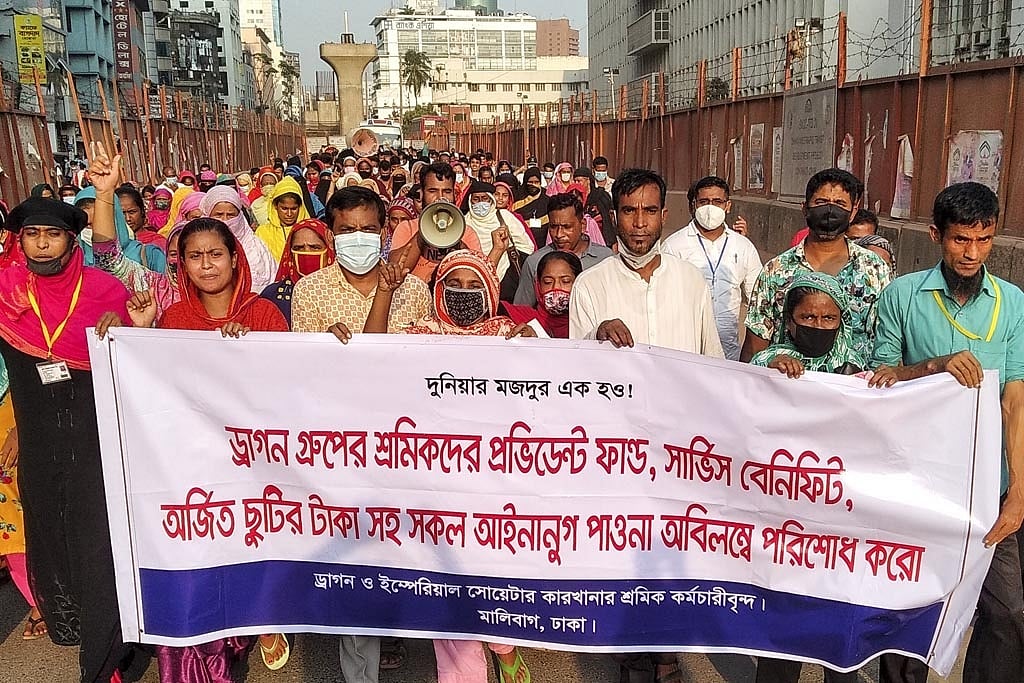 Workers of Dragon Sweater Bangladesh and Imperial Sweater Industries rally outside the National Press Club in Dhaka on Sep 6, 2020, demanding payment of dues from the provident fund, service benefit and earned leaves. 