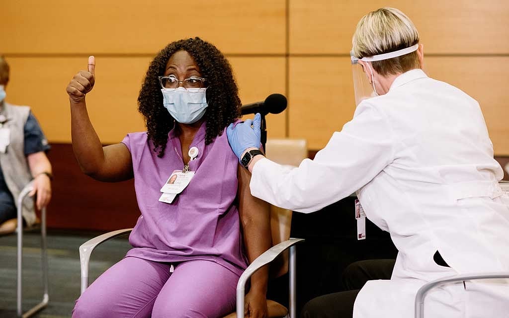 ‘A shot of hope’: What the vaccine is like for frontline doctors and nurses