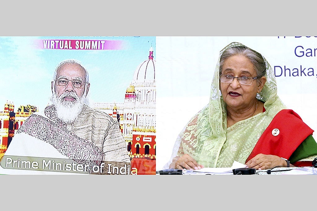 করোনাভাইরাস মহামারীকালে ভার্চুয়ালি সম্মেলনে মিলিত হয়েছিলেন শেখ হাসিনা ও নরেন্দ্র মোদী।  ফাইল ছবি