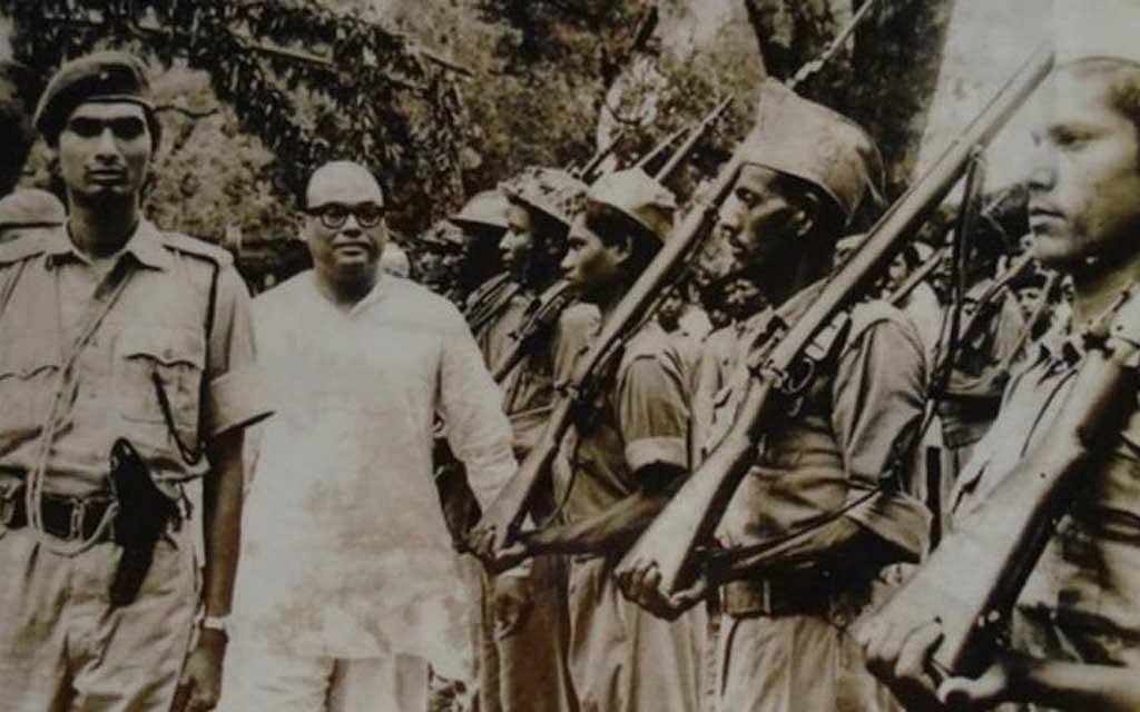 Syed Nazrul Islam, the Acting President of Bangladesh during the Liberation War, was accorded a guard of honour following the swearing-in ceremony of the first government of independent Bangladesh in Mujibnagar. Syed Nazrul Islam, the Acting President of Bangladesh during the Liberation War, was accorded a guard of honour following the swearing-in ceremony of the first government of independent Bangladesh in Mujibnagar.