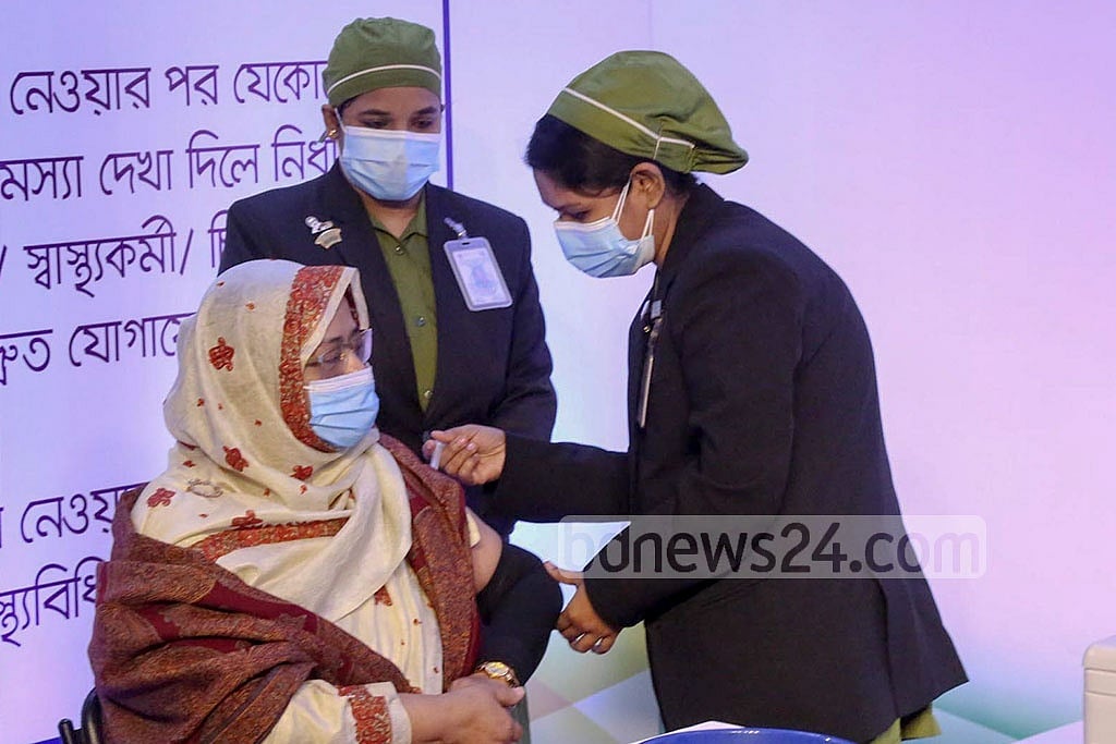 Dr Nasima Sultana, an additional director general of health services, was among the first five people to receive the coronavirus vaccine in Dhaka’s Kurmitola General Hospital on Wednesday, Jan 27, 2021. Photo: PMO 