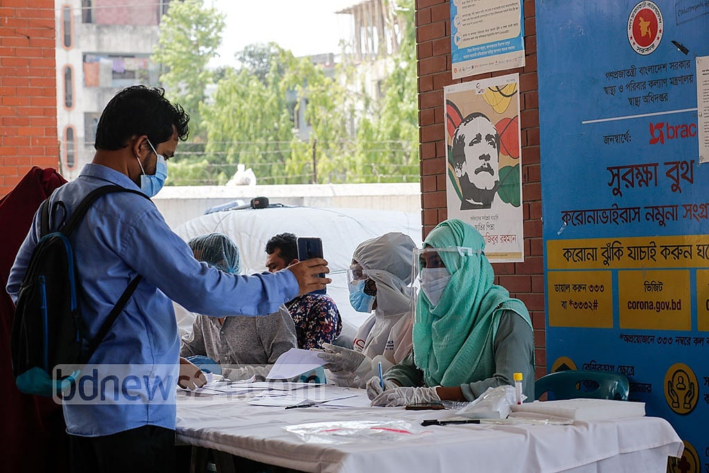 Bangladesh reports 41 new virus deaths in a day, cases jump by 1,822