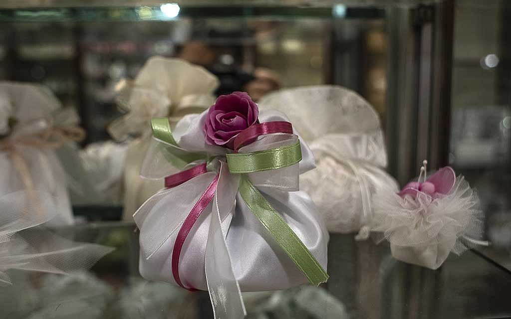 Ceremonial candy satchels in the store at the Confetti Pelino candy factory in Sulmona, Italy, May 28, 2021. The New York Times 