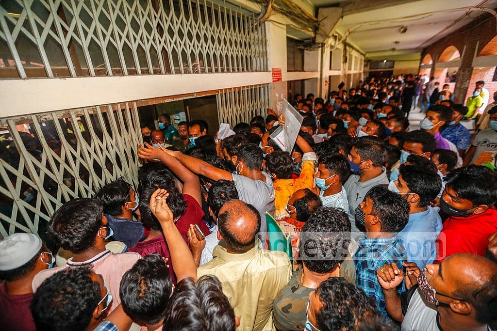 Jul 14, 2021: Bangladeshi migrant workers demonstrate outside Shaheed Suhrawardy Medical College Hospital in Dhaka against 'irregularities' in the distribution of coronavirus vaccines after a delay in getting their shots. Jul 14, 2021: Bangladeshi migrant workers demonstrate outside Shaheed Suhrawardy Medical College Hospital in Dhaka against 'irregularities' in the distribution of coronavirus vaccines after a delay in getting their shots.