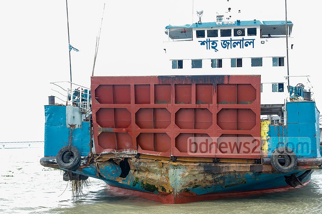 Jul 23, 2021: A ferry, named Shah Jalal, crashes into a pillar of the Padma Bridge while heading to the Shimulia port from Banglabazar in Madaripur. The collision left a large dent on the front end of the ferry. Five such incidents took place in two months, prompting the authorties to suspend ferry operations on the route. Photo: Mahmud Zaman Ovi Jul 23, 2021: A ferry, named Shah Jalal, crashes into a pillar of the Padma Bridge while heading to the Shimulia port from Banglabazar in Madaripur. The collision left a large dent on the front end of the ferry. Five such incidents took place in two months, prompting the authorties to suspend ferry operations on the route. Photo: Mahmud Zaman Ovi