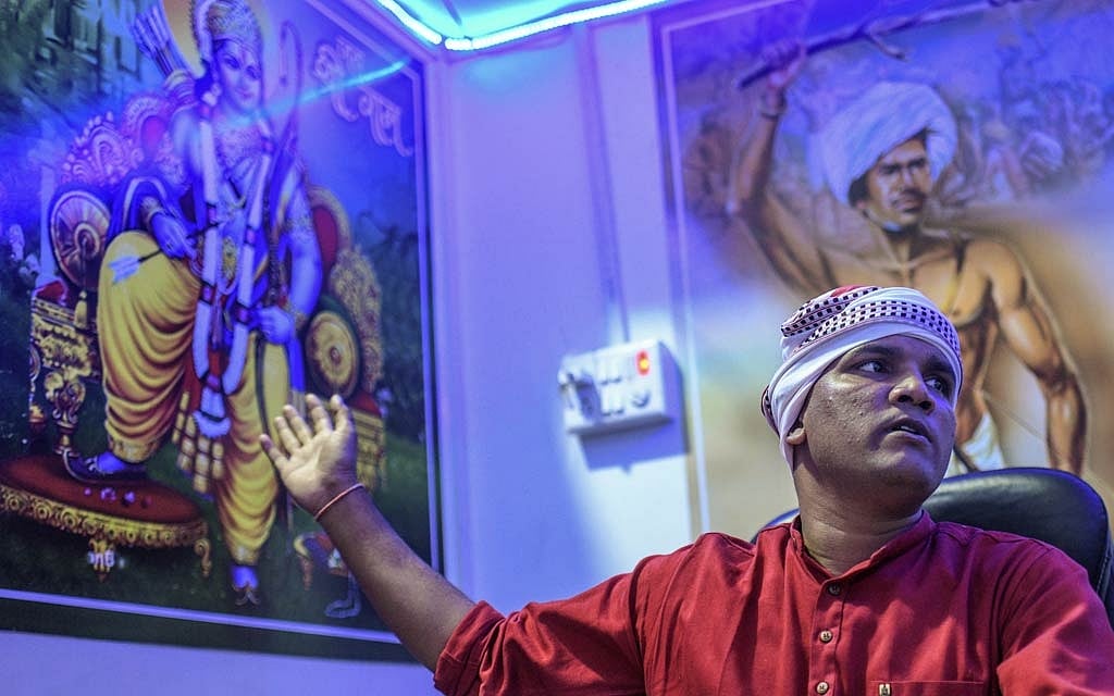 Dilip Chouhan, part of a growing network of anti-Christian Hindu nationalists who, energised by a new anti-conversion law in their state of Madhya Pradesh, have stormed churches, at his office in Alirajpur, India, Feb 16, 2021. The New York Times 